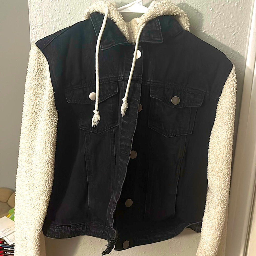 No Boundaries Black Jean Jacket with cream colored fuzzy sleeves.